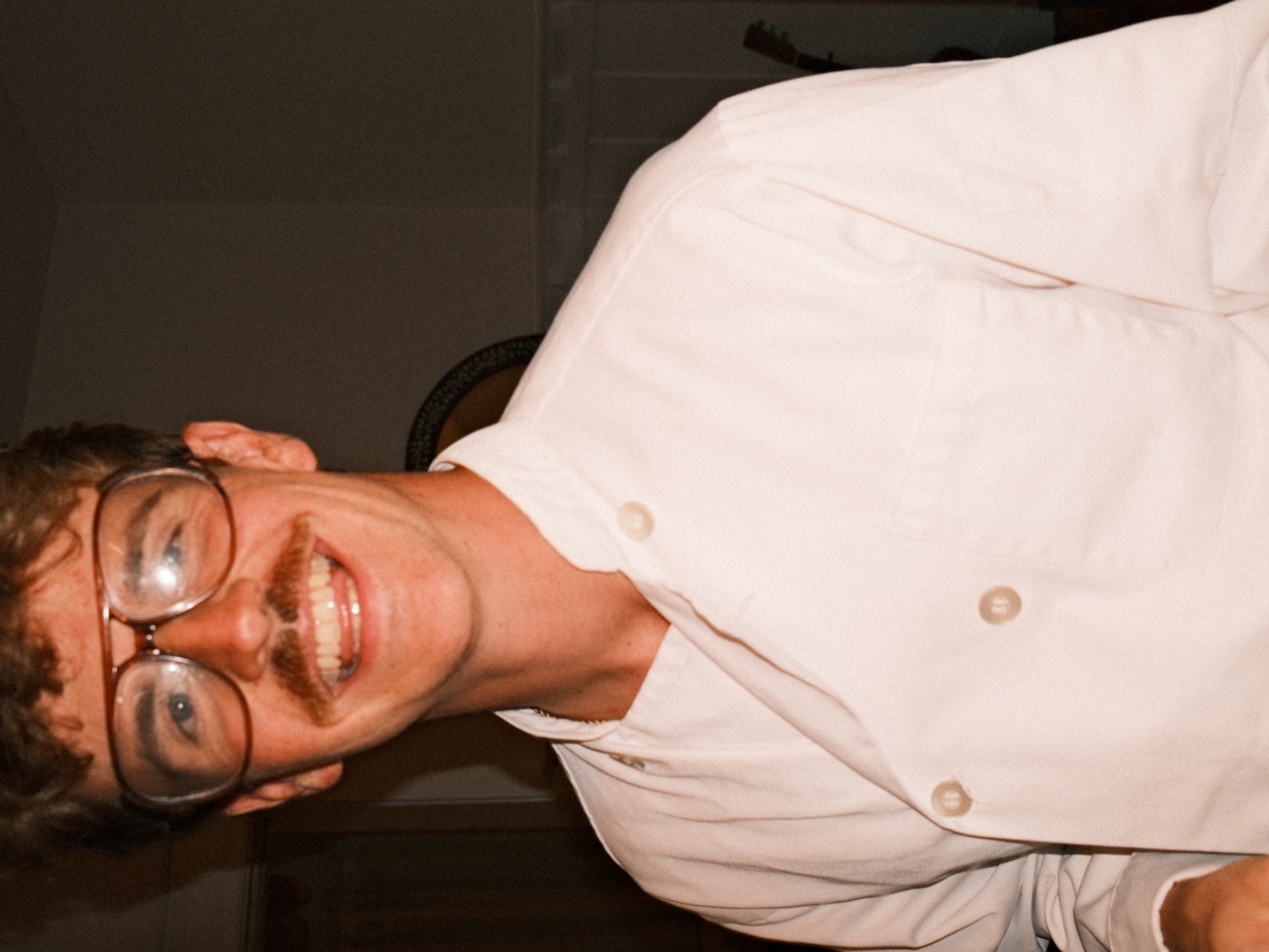 Chef Zack Senac laughing in his chef coat