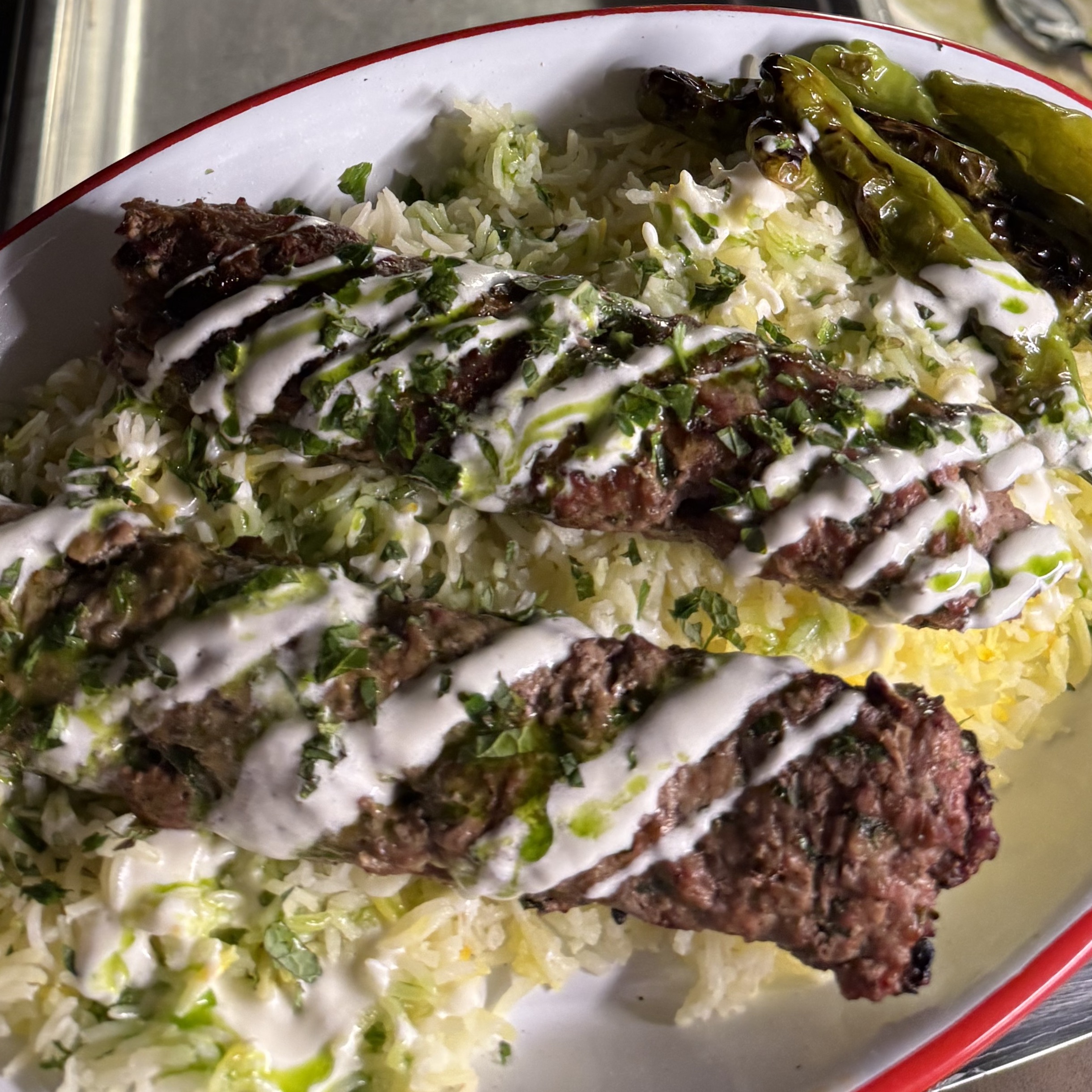 Grilled beef, rice, and peppers