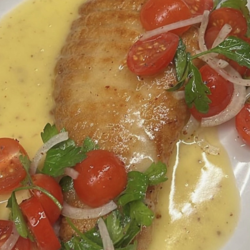 Crisp fish, tomatoes, and sauce