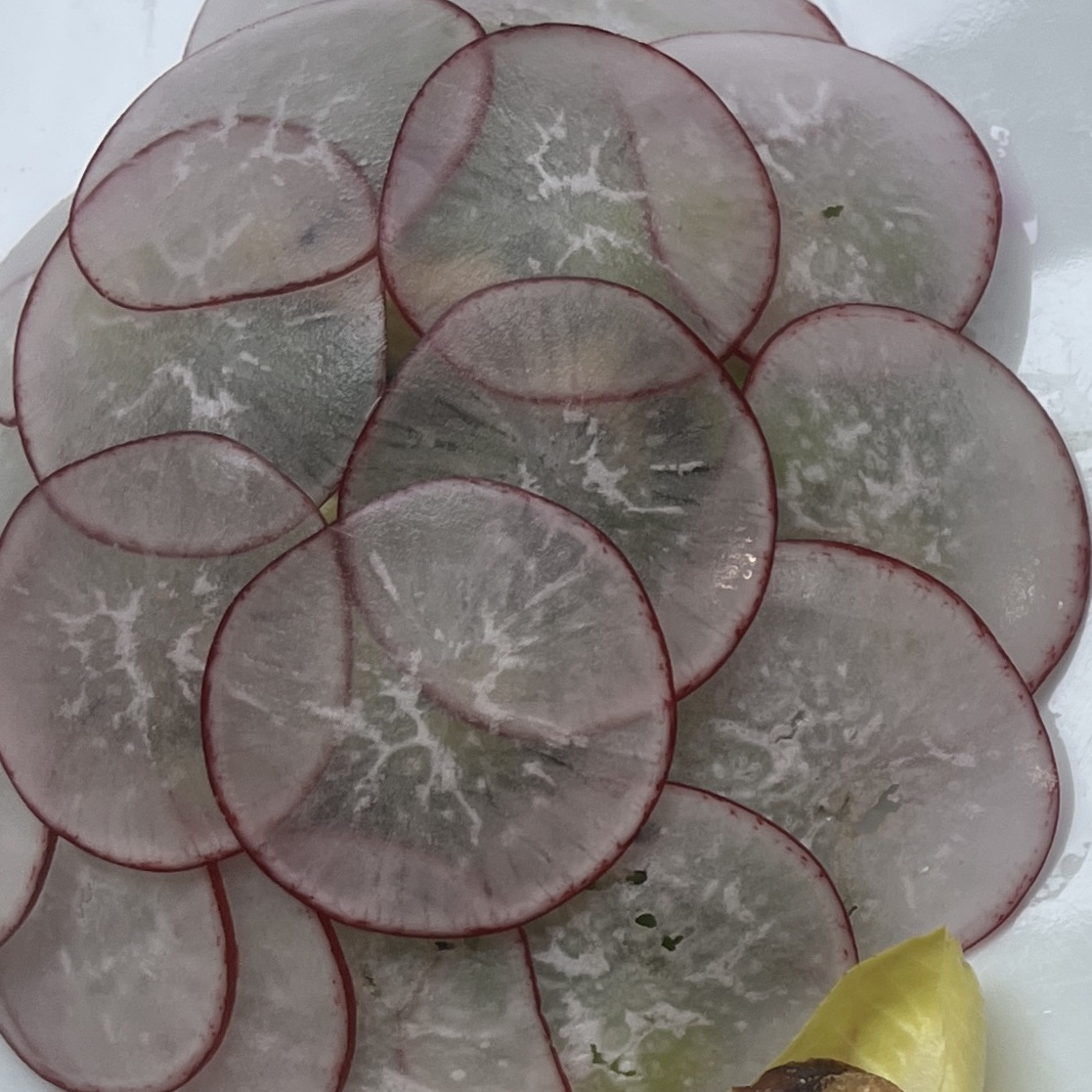 Thinly sliced radishes